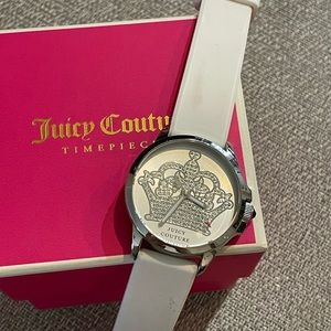 Classy Juicy Couture watch.. white w/ blinged out “juicy” crown detail on face.